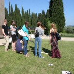 The models are striking against the equally sylphlike cypress trees
