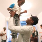 Salieu has fun with Cy, one of NY's youngest art fans.