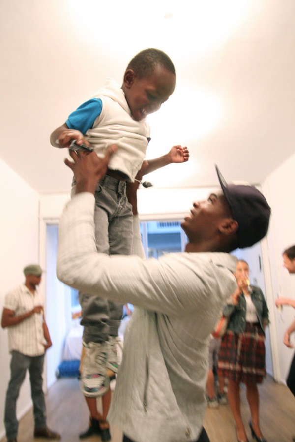Salieu has fun with Cy, one of NY's youngest art fans.