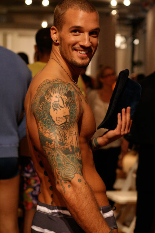 Parker's colorful and symbolic tattoos gmhc13a