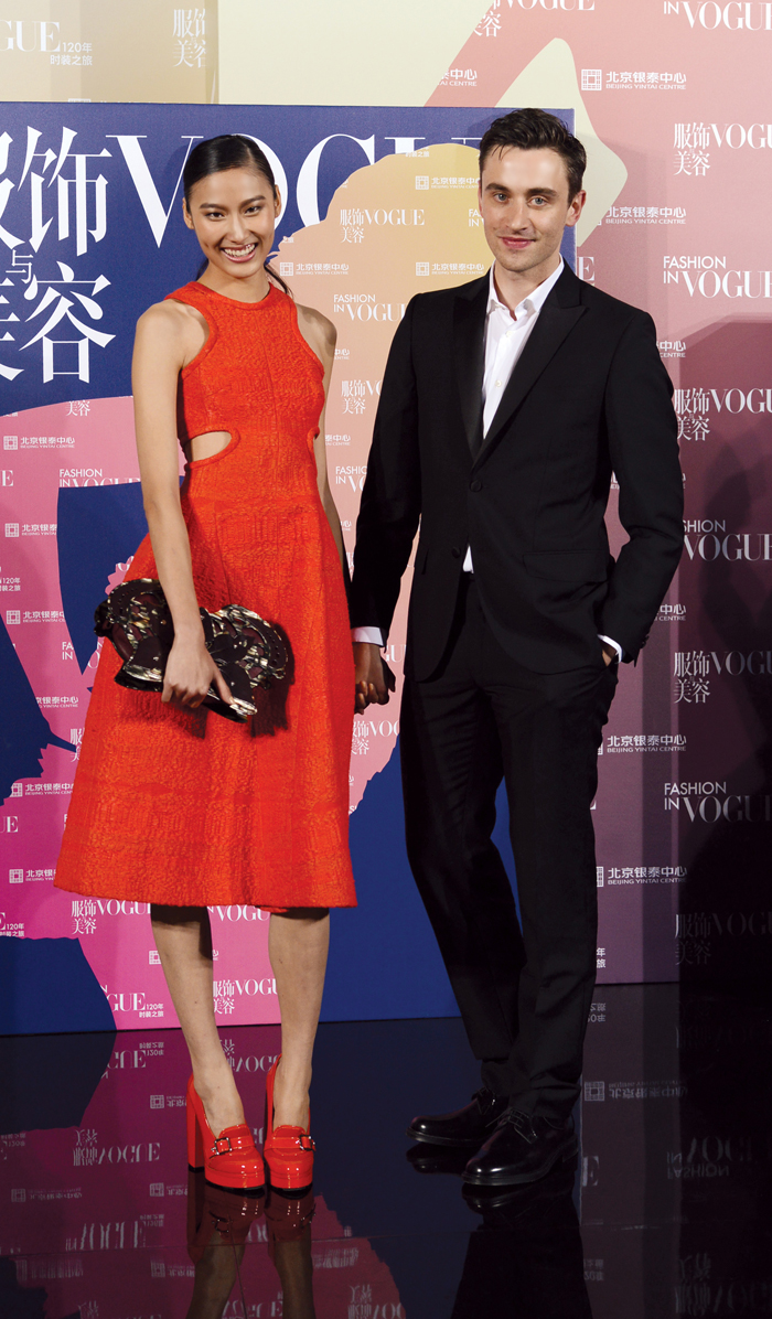 Carven's-Guillaume-Henry-with-Shiqing-Wang-in-Carven
